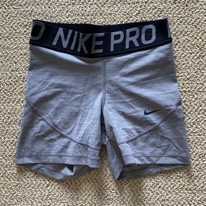 heathered grey 5” nike pros, size S.